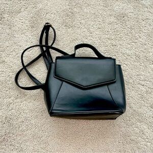 A New Day black faux leather backpack Leather snap closure mini back